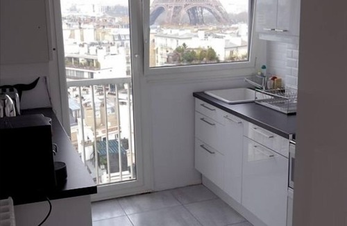 Grenelle Apartment | Paris Apartment : Eiffel View from All RoomsBalcony, Air Con