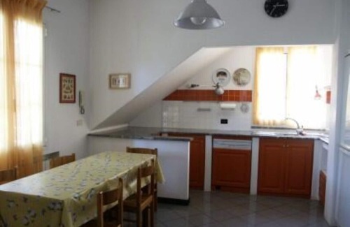 Strada Nazionale Sud House | Part of a villa with pool.