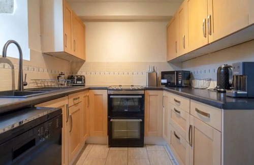 Cheltenham House | Pass the Keys | Converted 17th century barn with garden parking