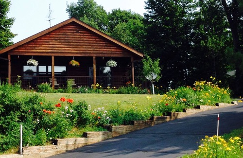 Arbor Vitae House | Peaceful And Serene Location With Great Lake View, Fishing, And Wildlife Sights.