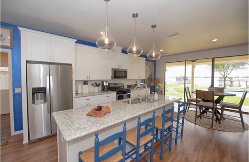 El Lago House | Pelican Bay Estate- A Luxury Waterfront Vacation Home