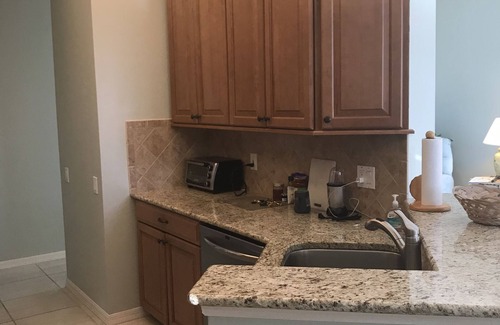Pelican Bay Condo | Pelican Bay, Lambiance Garden Condo, second floor with full lake western view.