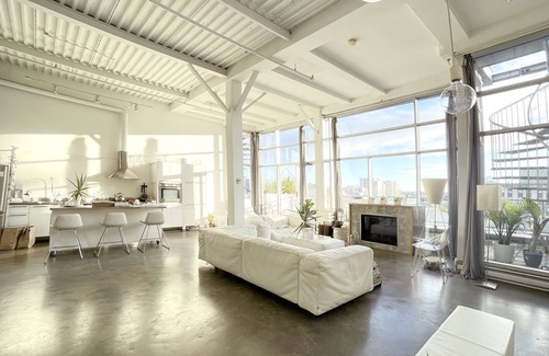 Gastown Condo | Penthouse loft with deck, rooftop and fireplace in historic Gastown, Vancouver.