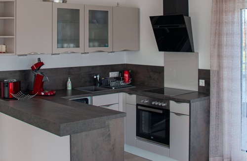 Waschenbeuren Apartment | Penthouse with roof terrace and an unobstructed view of the Hohenstaufen.