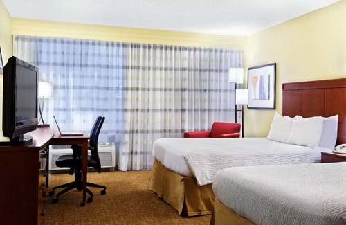 Brookhollow Hotel | Pet-Friendly Retreat Perfect for Family Fun in Houston | Close to Art Car Museum