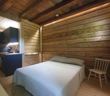 Muurame Apartment | Pieni asunto maalla navettarakennuksessa.