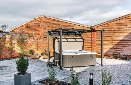 Pontesbury House | Pigeon House - Unique Barn with private garden, hot tub and wood burner