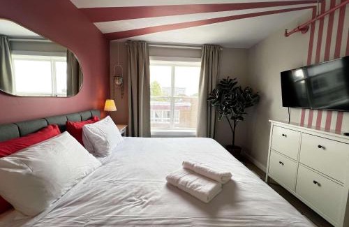 Downtown Apartment | Pink Sunrise Energetic Studio #7 at Ports on Portland, King Bed and Bold Decor