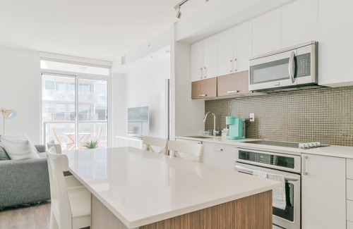 East Village Condo | Posh 2BR Condo near Stampede w/ Undrgrnd Parking