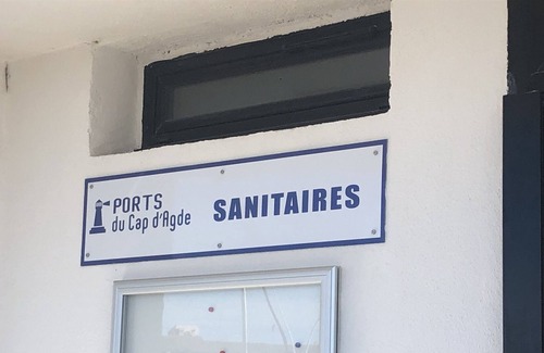 Naturist Village Boat Rental | Pretty sailboat at the quay on the quiet side of the naturist port