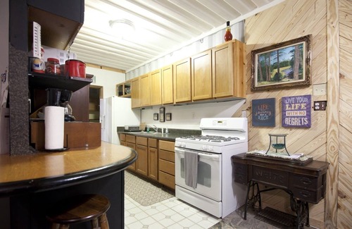 Sequatchie House | Private 50 ft waterfall. Eco-friendly, cozy shipping container cabin
