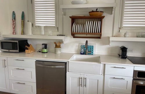 Cliffdwellers Cottage | Private Cottage with Stunning Views of Caribbean Sea Walk to Beach & Restaurants