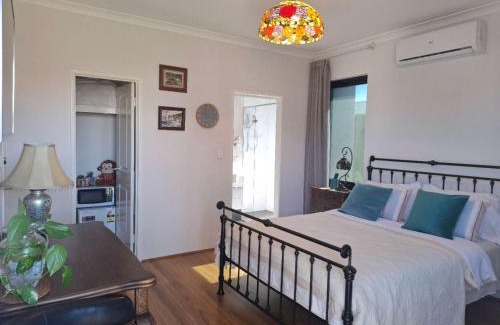 Brentwood House | Private Entrance, Guest Suite with Garden View