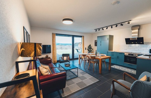 Bruschied Apartment | Private holiday apartment in the Hunsrück with a wonderful valley view and cedar sauna