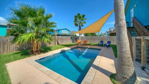 Leeward Sands House | Private Pool Large Yard Game Room Balcony South By Sunkissed by Avantstay