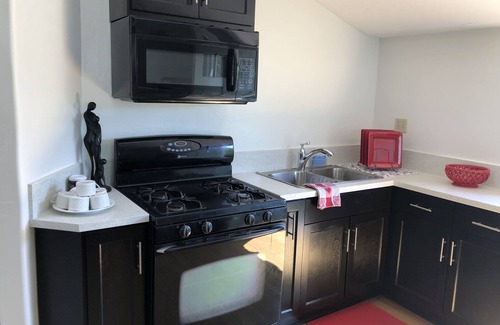 Downey Apartment | Private property beautifully landscaped and pool with a 2 bed 1 ba unit