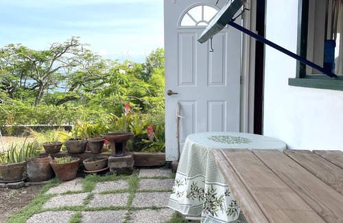 Falmouth Harbour Cottage | Private Quiet Secluded Cottage nestled in hills above Falmouth Harbour