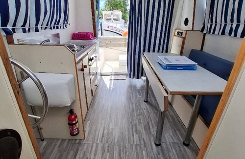 Chenille-Change Boat Rental | Private Riverside Boat Stay in Quaint Chenillé-Changé for 5 Guests