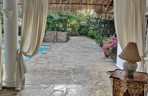 Malindi Marine National Park Villa | Private villa with swimming pool and tropical garden.