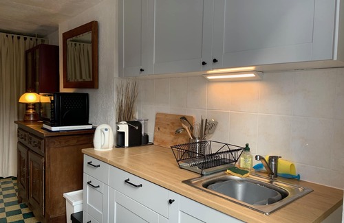 Saint-Christophe-du-Luat House | Quaint white house with character, garden, and garage