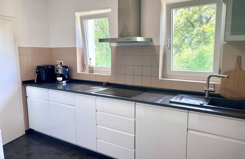 Munchen District Apartment | Quiet balcony apartment in the noble suburb of Munich Gräfelfing with a view of the countryside