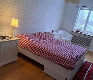 Grycksbo Apartment | Röda villan