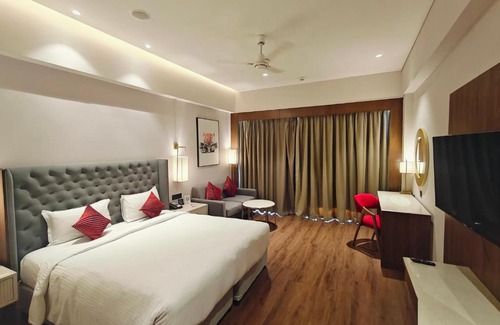 Kurnool Hotel | Ramada by Wyndham Ahmedabad Narendra Modi Stadium Motera