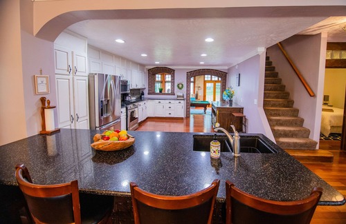 Glenwood House | Rare find! Spacious home near wedding venues & CB/OMA. Perfect for entertaining!