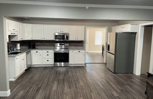Mustang House | Recharge at our family friendly home in Mustang! Close to the airport!