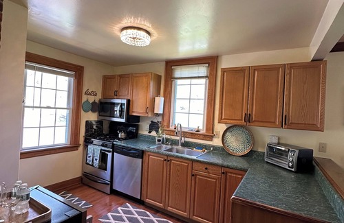Windham House | Red Fox T.H. & Spa hot tub - mini golf tee off & outside living room & firepit