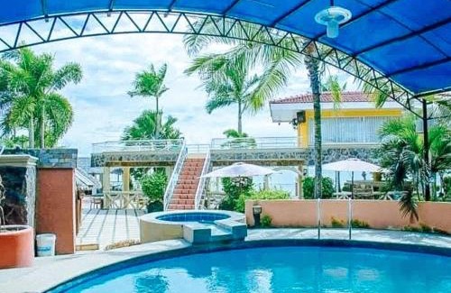 Talisay Hotel | RedDoorz Premium at Villa Kristalene Resort