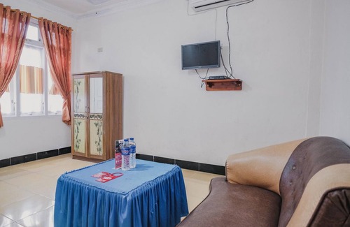 Gunung Sugih Hotel | RedDoorz Syariah near Kebun Raya Liwa