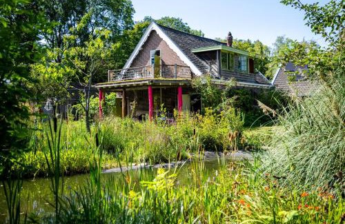 Zuidoost House | Reijgershof - Yurt Experience with garden view