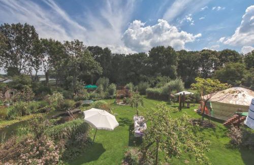 Zuidoost House | Reijgershof - Yurt Experience with garden view