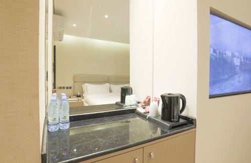 Al-Nakheel Apartment | Relax in this quiet and elegant place, a beautiful sunset in Al Nakhil walkway.