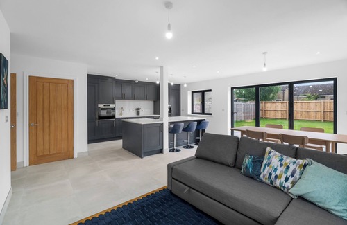 Cambridge House | Relax with easy access to Cambridge. Electric car charging and parking available