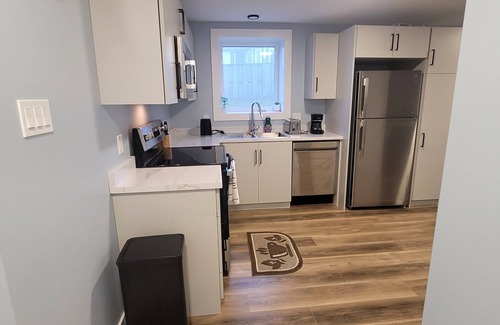 Terra Nova Apartment | Relax with the whole family at this peaceful place to stay. Close to yyt.