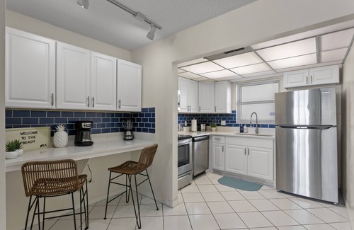 Madeira Beach Condo | REMODELED, immaculately designed, BEACHFRONT condo with gorgeous water views