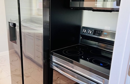 Dunbar Apartment | Remodeled townhouse - 5 mins from Shawnee Sports Complex!