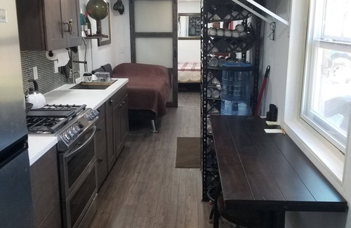 Linden Cabin | Remote 64 acre forest with fishing pond, cabin, barn, greenhouse,