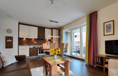 Duhnen Apartment | Residenz Hohe Lith - Holiday apartment 205 with beach chair on the beach