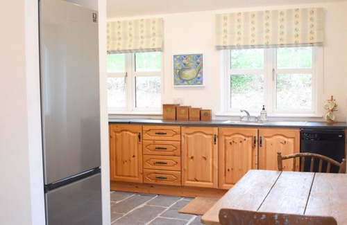 Kinsale House | Restored traditional, old world cottage overlooking the sea in Kinsale