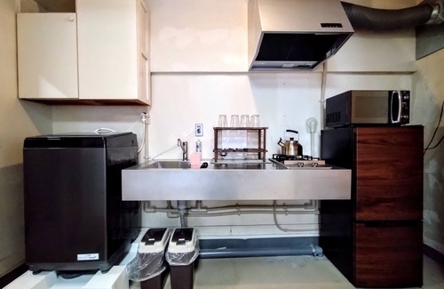 Yokosuka House | Retro Romantic Room! Private rooftop room with a view of Tokyo Bay beyond the Uraga Dock.