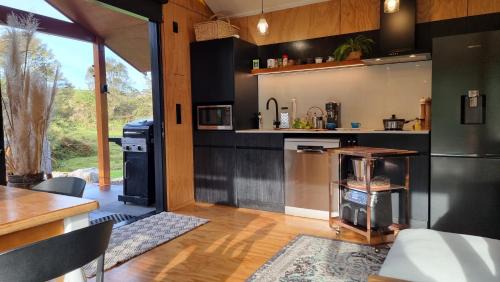 Waitomo District House | Ripples Retreat - Riverside Luxury