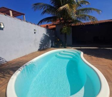 Itaipuacu Apartment | RiqueHouse: Piscina, churrasqueira a 500m da praia