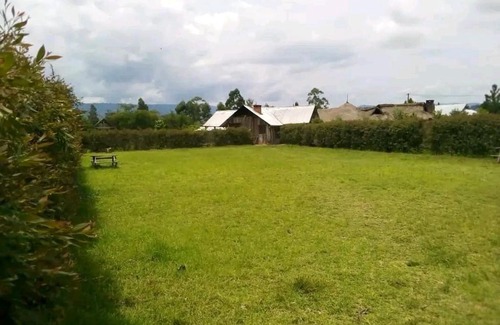 Rungwe Apartment | Riverbanks fish farm&Campsite