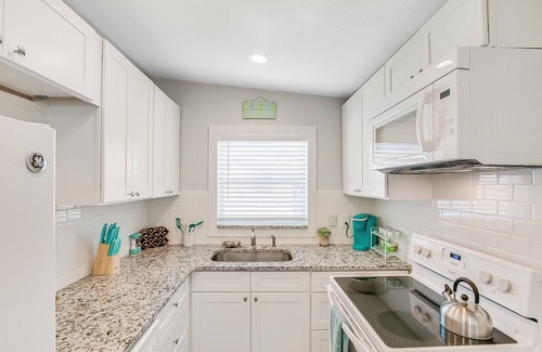 Orlando Beach Apartment | RIVERFRONT community in COCOA BEACH with short walk to the beach!