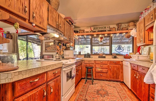 Mammoth Spring Cabin | Riverfront Getaway w/Treehouse, Fire Pit & Deck!