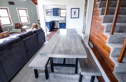 Reed City Ski Chalet | Riverfront | Hot Tub, Fireplace, Kayaks & Tubes