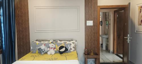 Sualkuchi Apartment | Riverside Palm Luxe 2BHK with AC in both bedrooms near Kamakhya & IHR